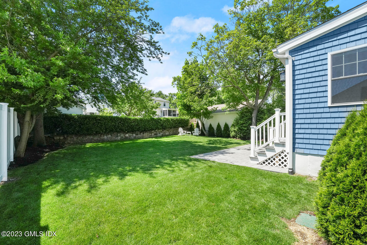 36 Sheep Hill Road Riverside, CT 06878 - Photo 33 of 37 a view of a house with a yard