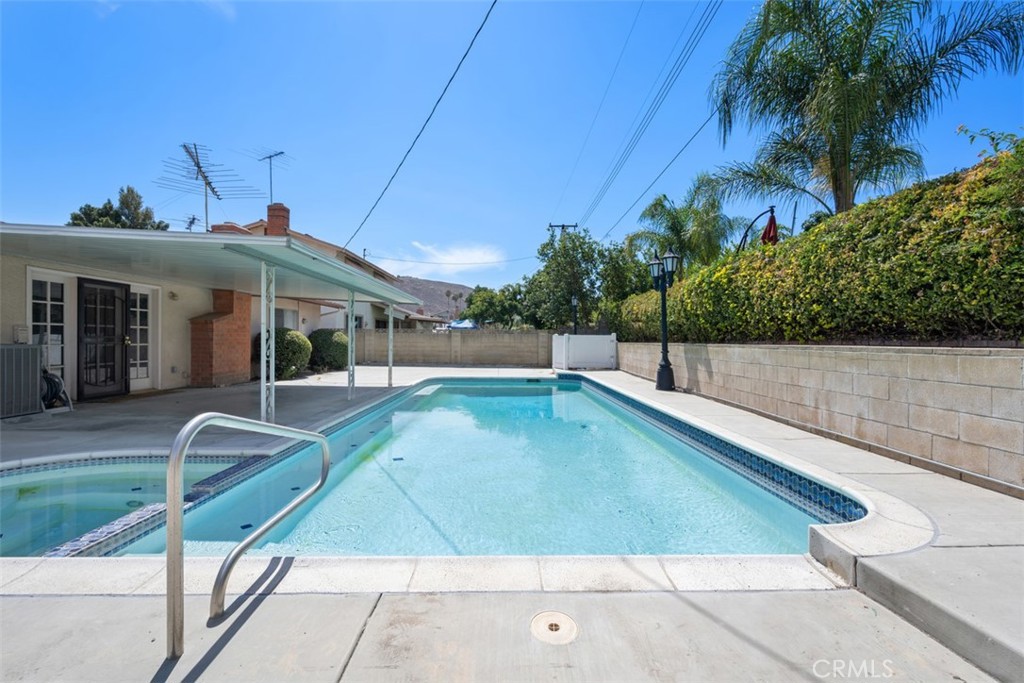 3636 Mapleleaf Drive Riverside, CA 92503 - Photo 1 of 1 a view of a patio with chairs and potted plants