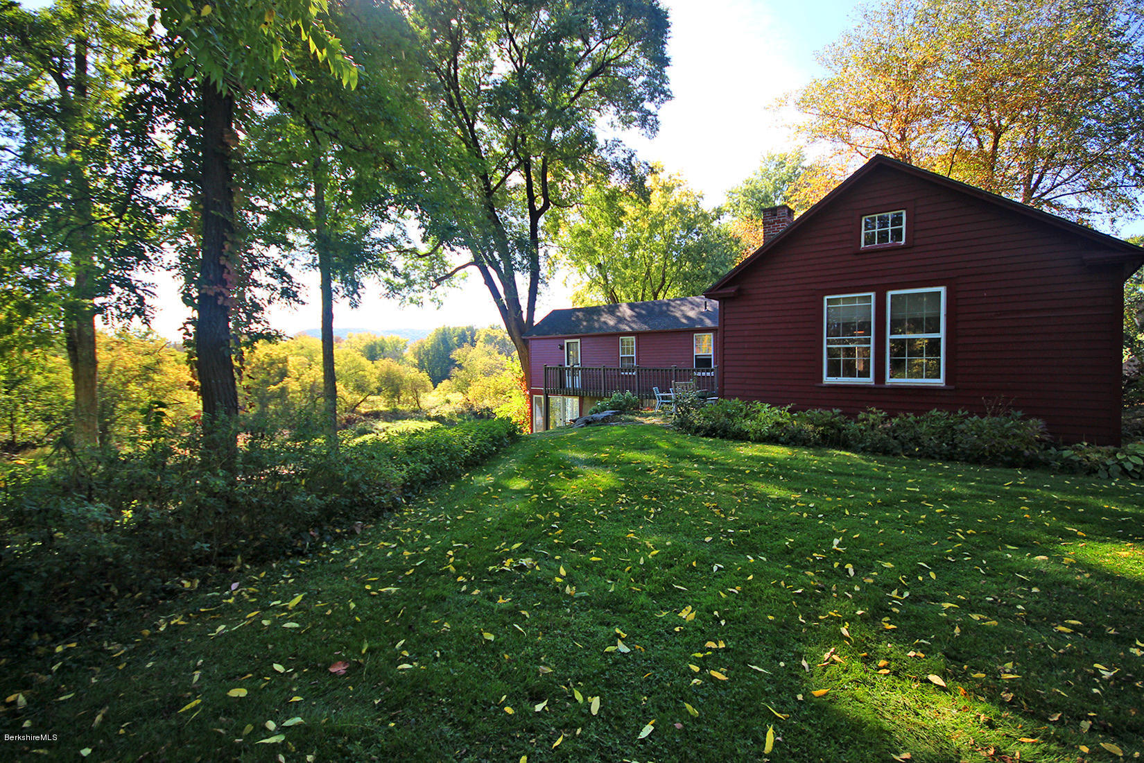20 Main Street Stockbridge, MA 01262 - Photo 2 of 40 a brick house with a large tree in front of it