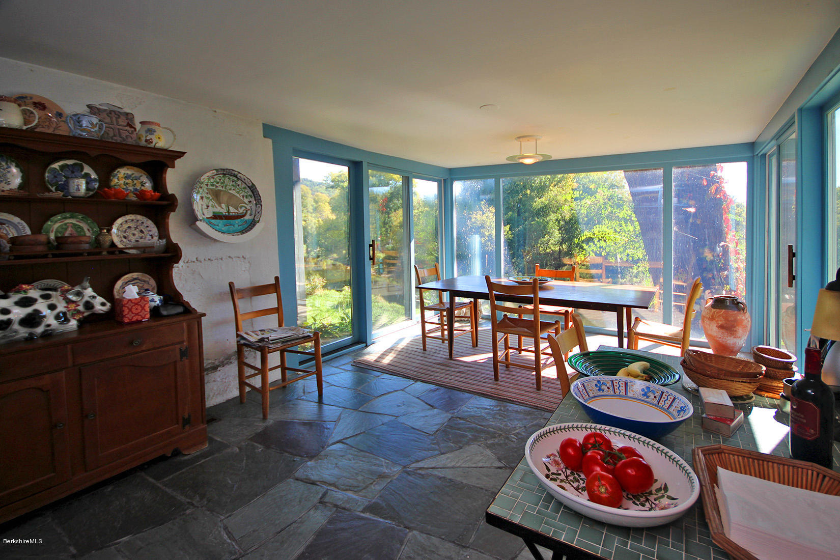 20 Main Street Stockbridge, MA 01262 - Photo 19 of 40 a living room with furniture and a floor to ceiling window