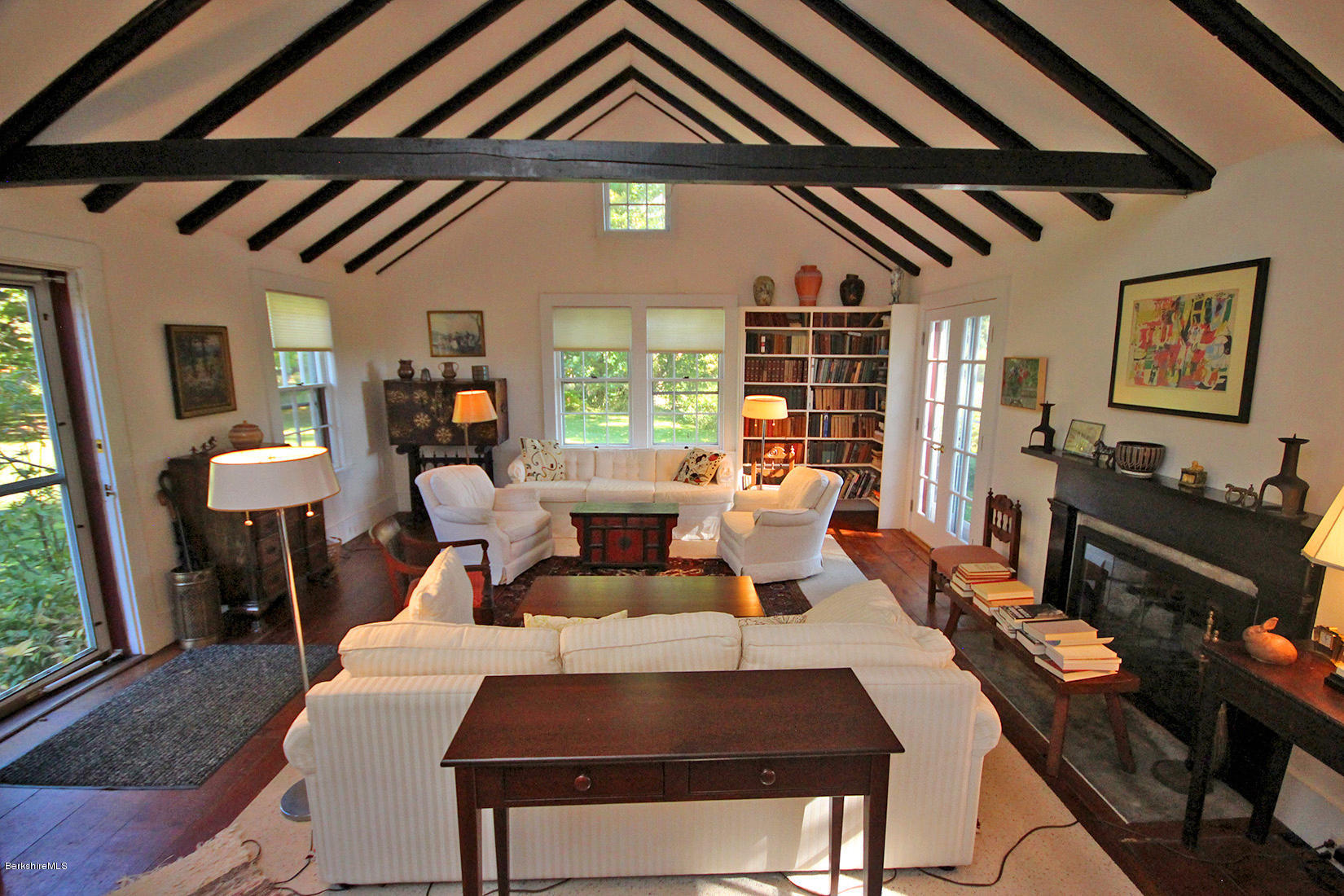 20 Main Street Stockbridge, MA 01262 - Photo 22 of 40 a living room with furniture and a wooden floor