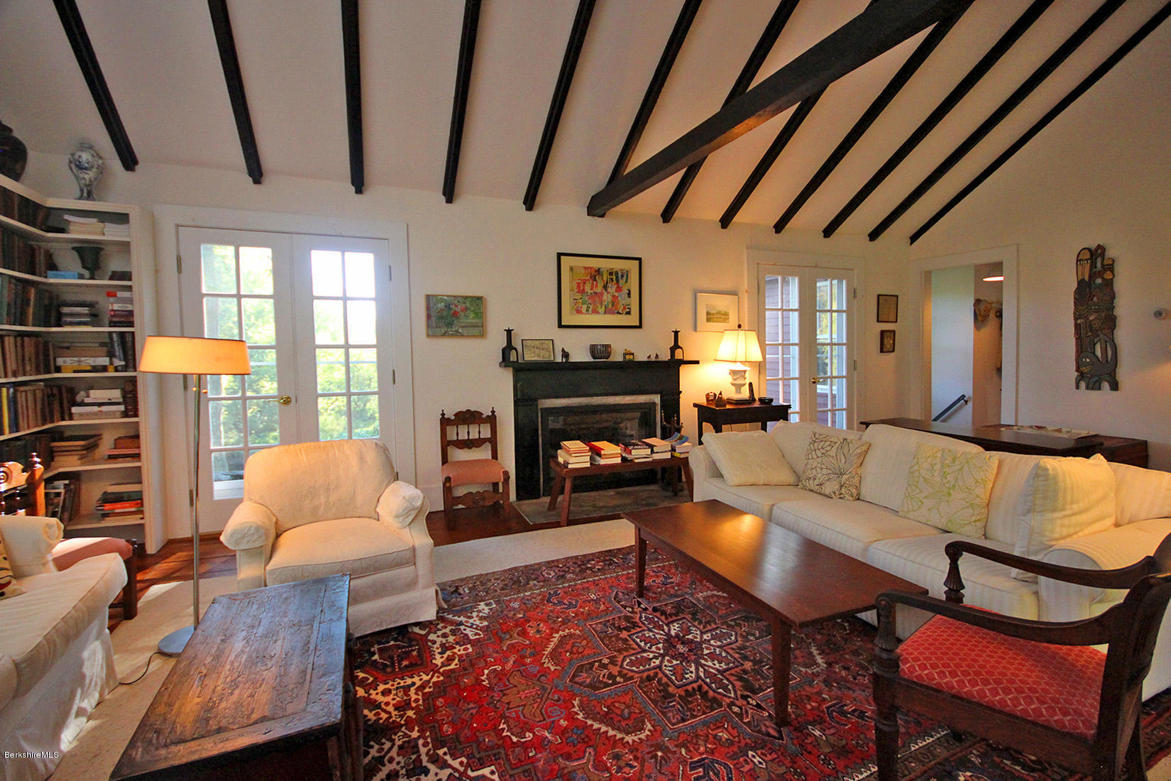 20 Main Street Stockbridge, MA 01262 - Photo 23 of 40 a living room with furniture and a fireplace
