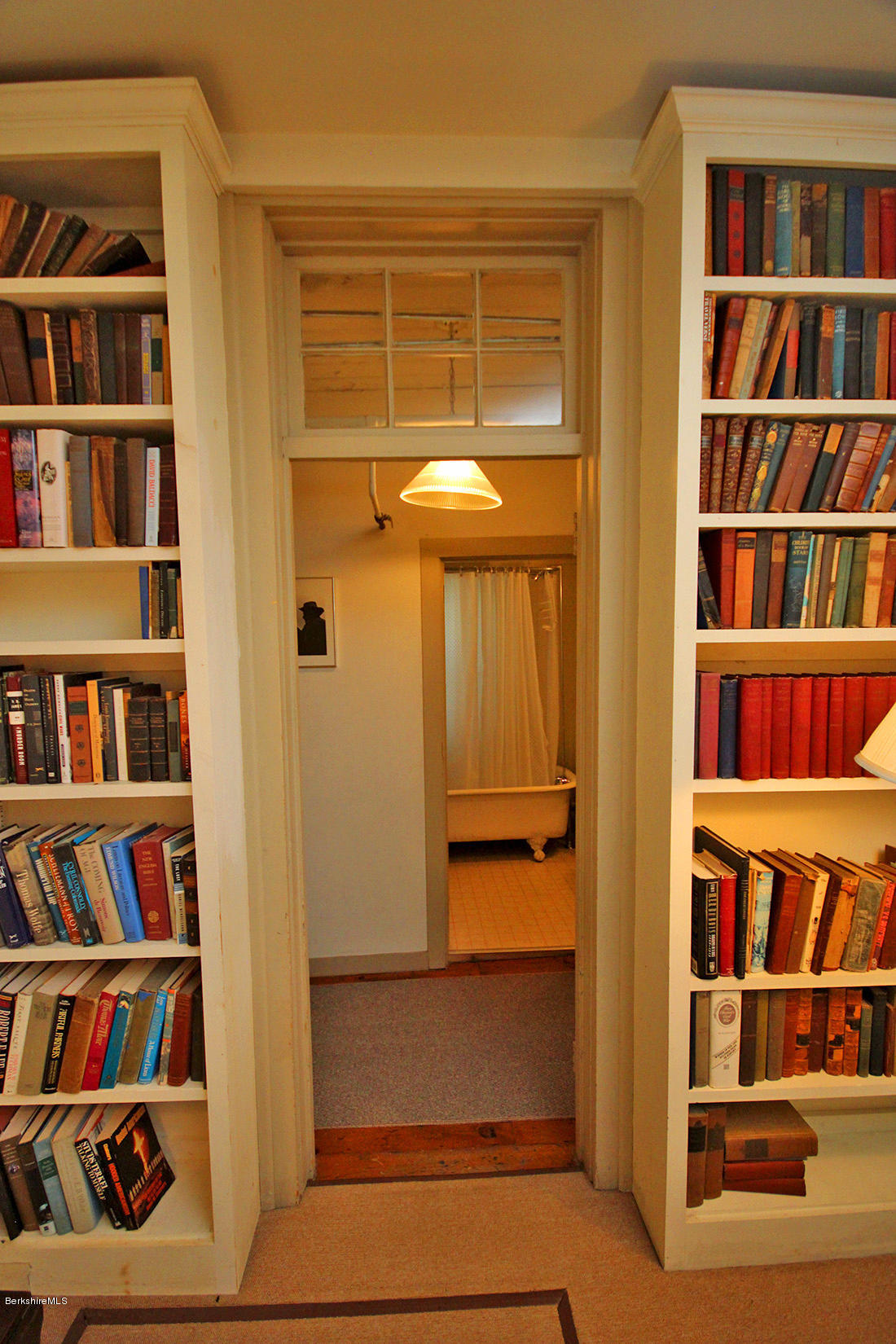 20 Main Street Stockbridge, MA 01262 - Photo 28 of 40 a view of walk in closet with clothes and shoes