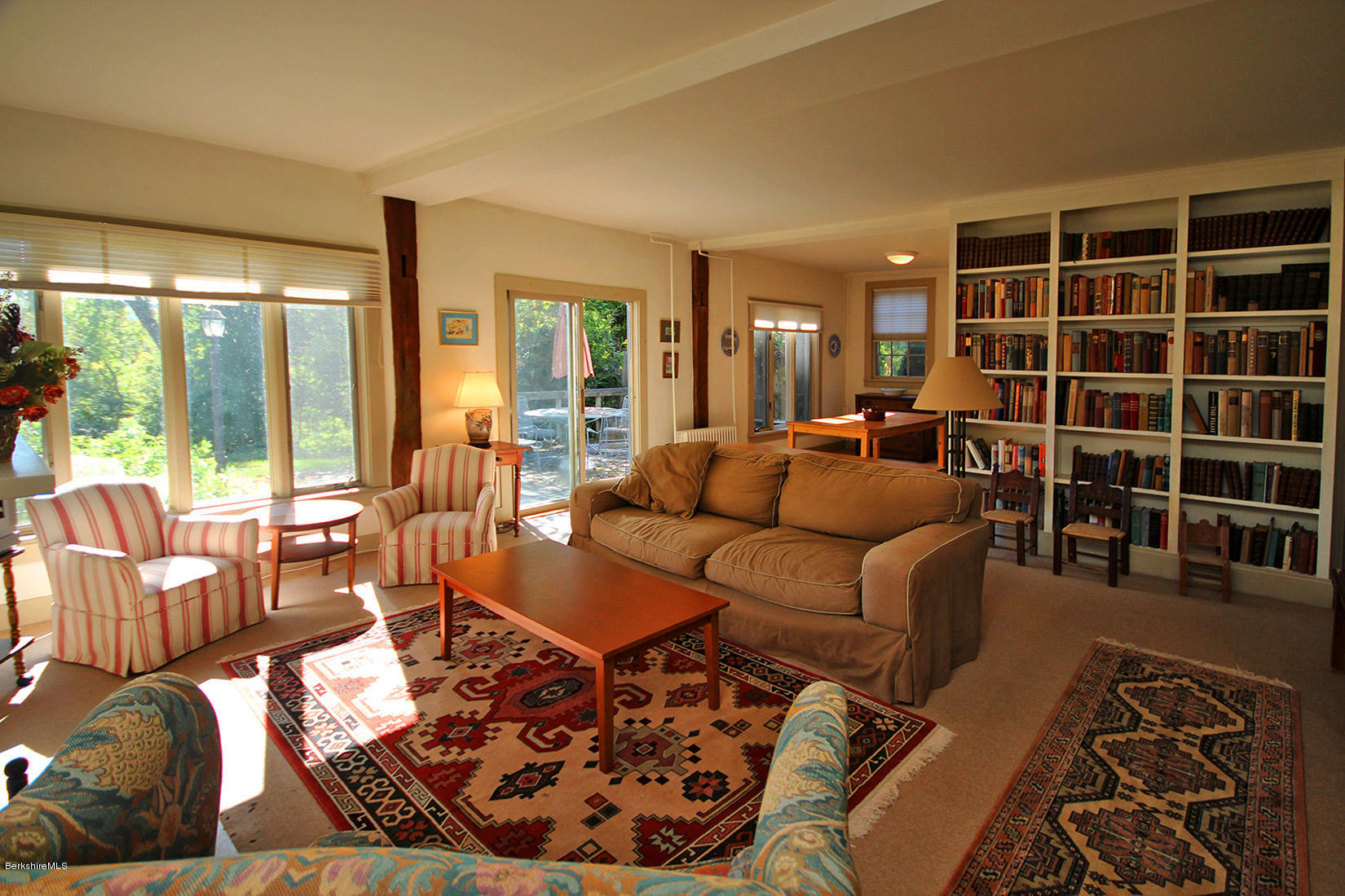 20 Main Street Stockbridge, MA 01262 - Photo 30 of 40 a living room with furniture and a large window