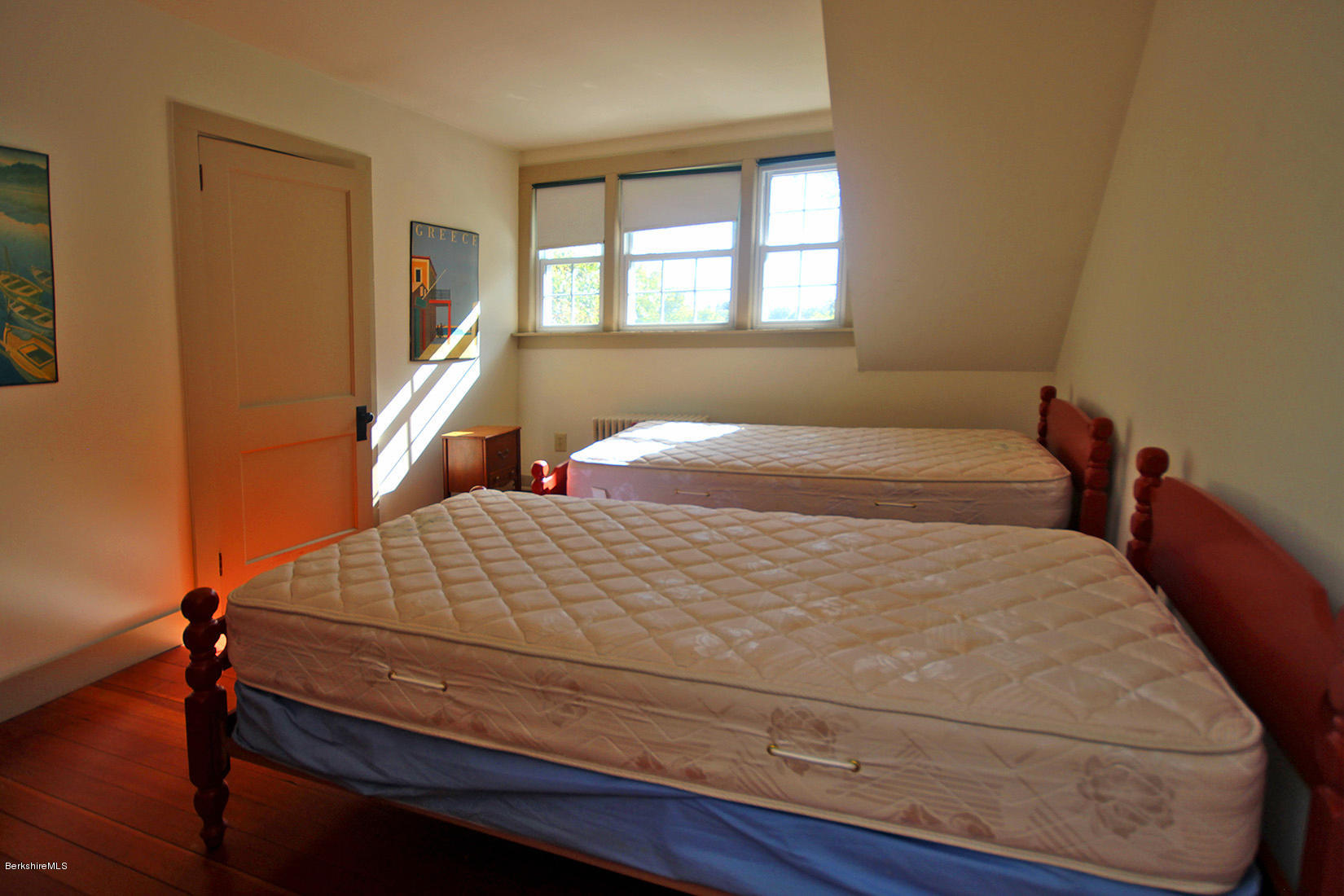 20 Main Street Stockbridge, MA 01262 - Photo 35 of 40 a bedroom with a bed and windows