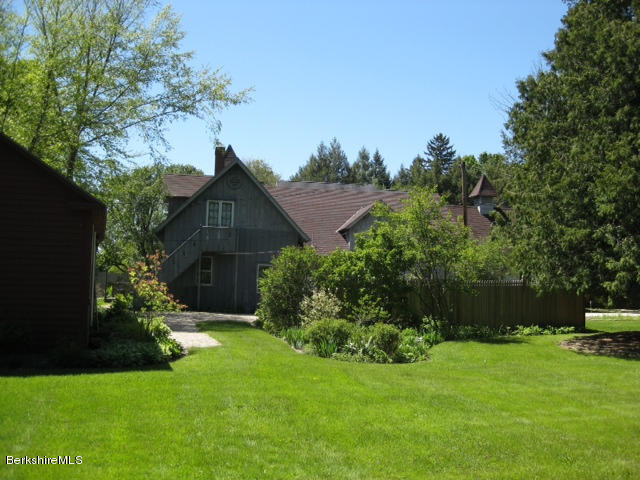 20 Main Street Stockbridge, MA 01262 - Photo 39 of 40 a front view of a house with garden