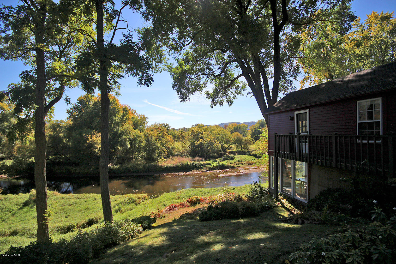 20 Main Street Stockbridge, MA 01262 - Photo 5 of 40 a view of a lake with a house in the background