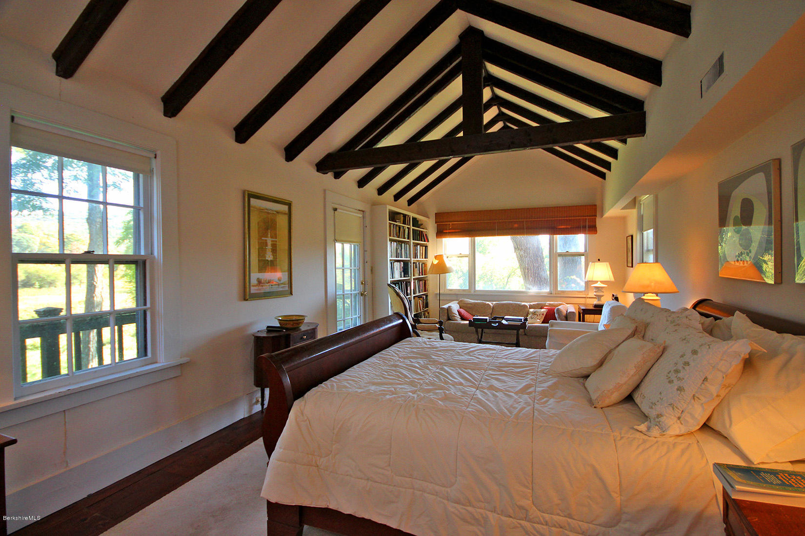 20 Main Street Stockbridge, MA 01262 - Photo 10 of 40 a bed sitting in a bedroom next to a window