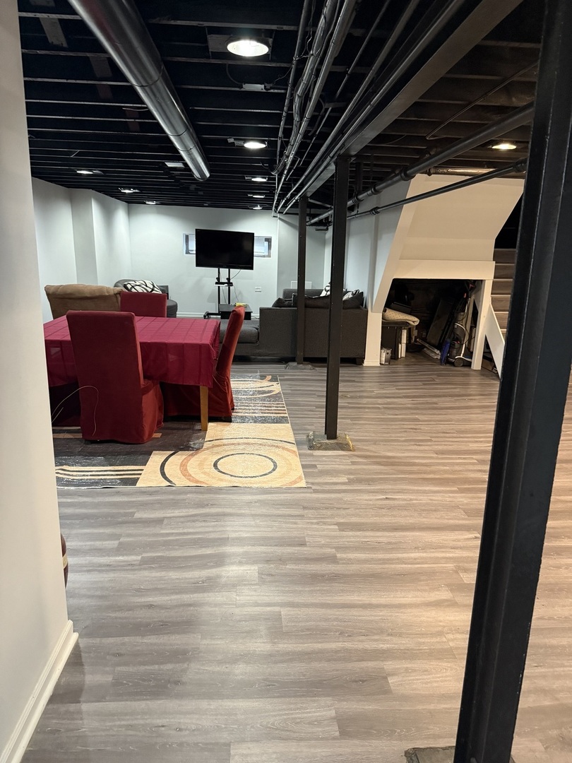 7825 South Paulina Street Chicago, IL 60620 - Photo 29 of 34 a view of swimming pool with a table and chairs