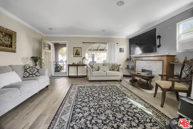 a living room with furniture and a table