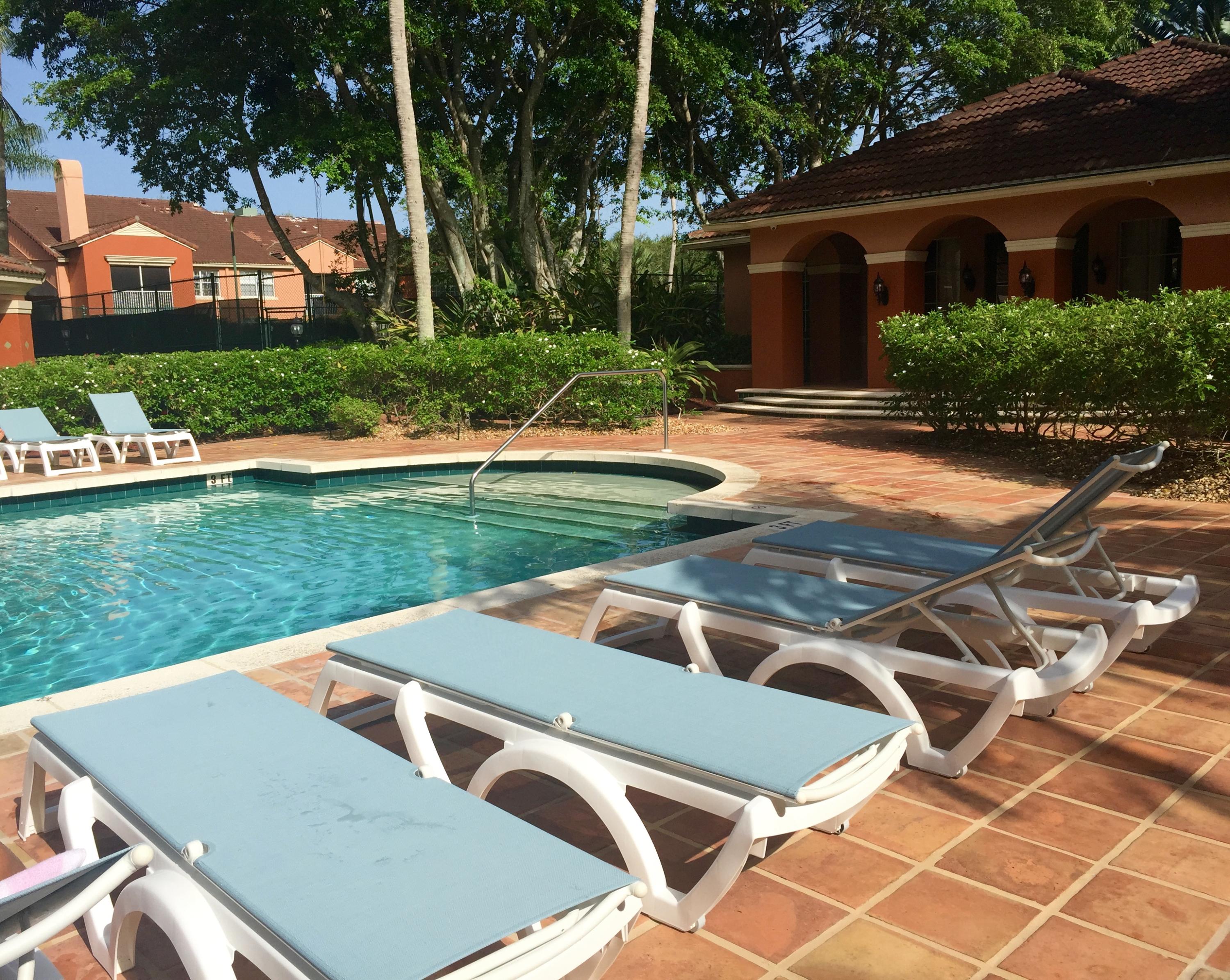 3111 Clint Moore Road, Unit 106 Boca Raton, FL 33496 - Photo 26 of 28 Pool Chaise
