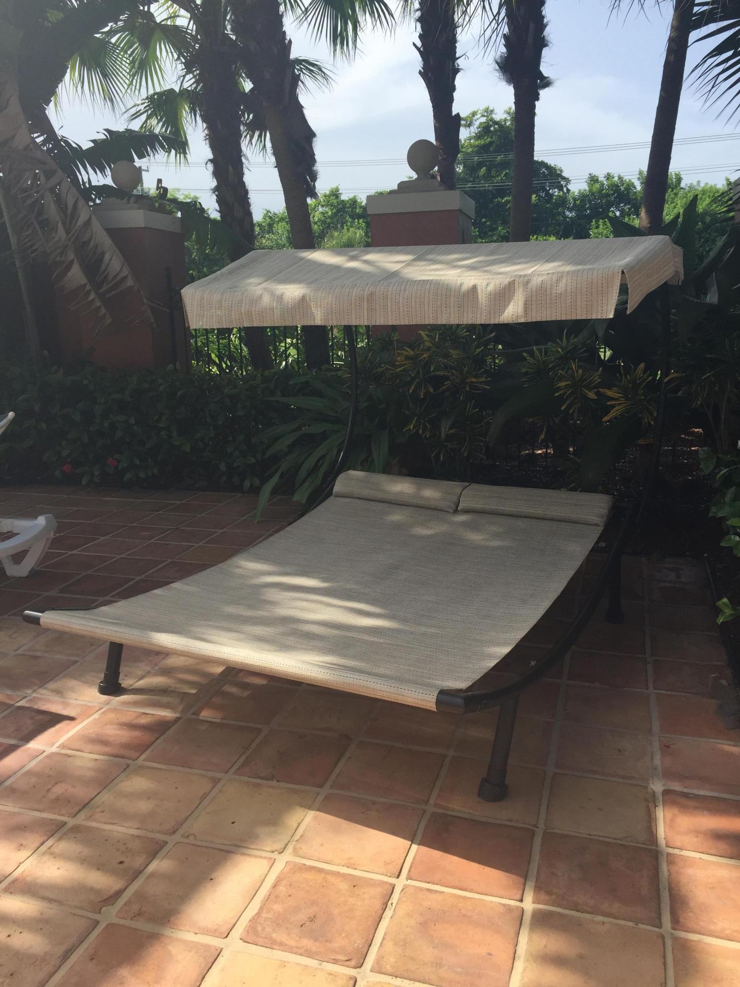 3111 Clint Moore Road, Unit 106 Boca Raton, FL 33496 - Photo 27 of 28 Pool Chaise