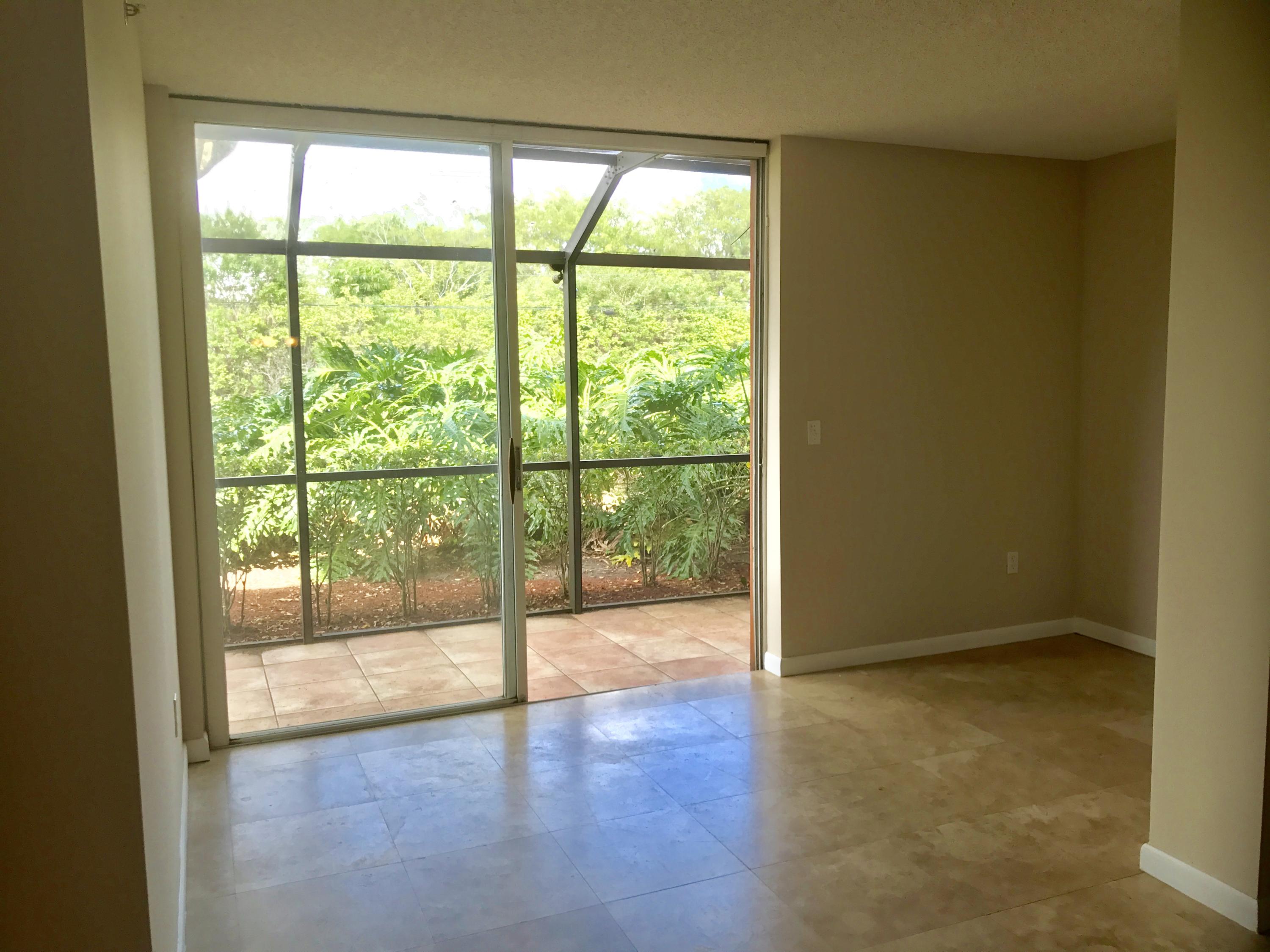 3111 Clint Moore Road, Unit 106 Boca Raton, FL 33496 - Photo 4 of 28 living room extension