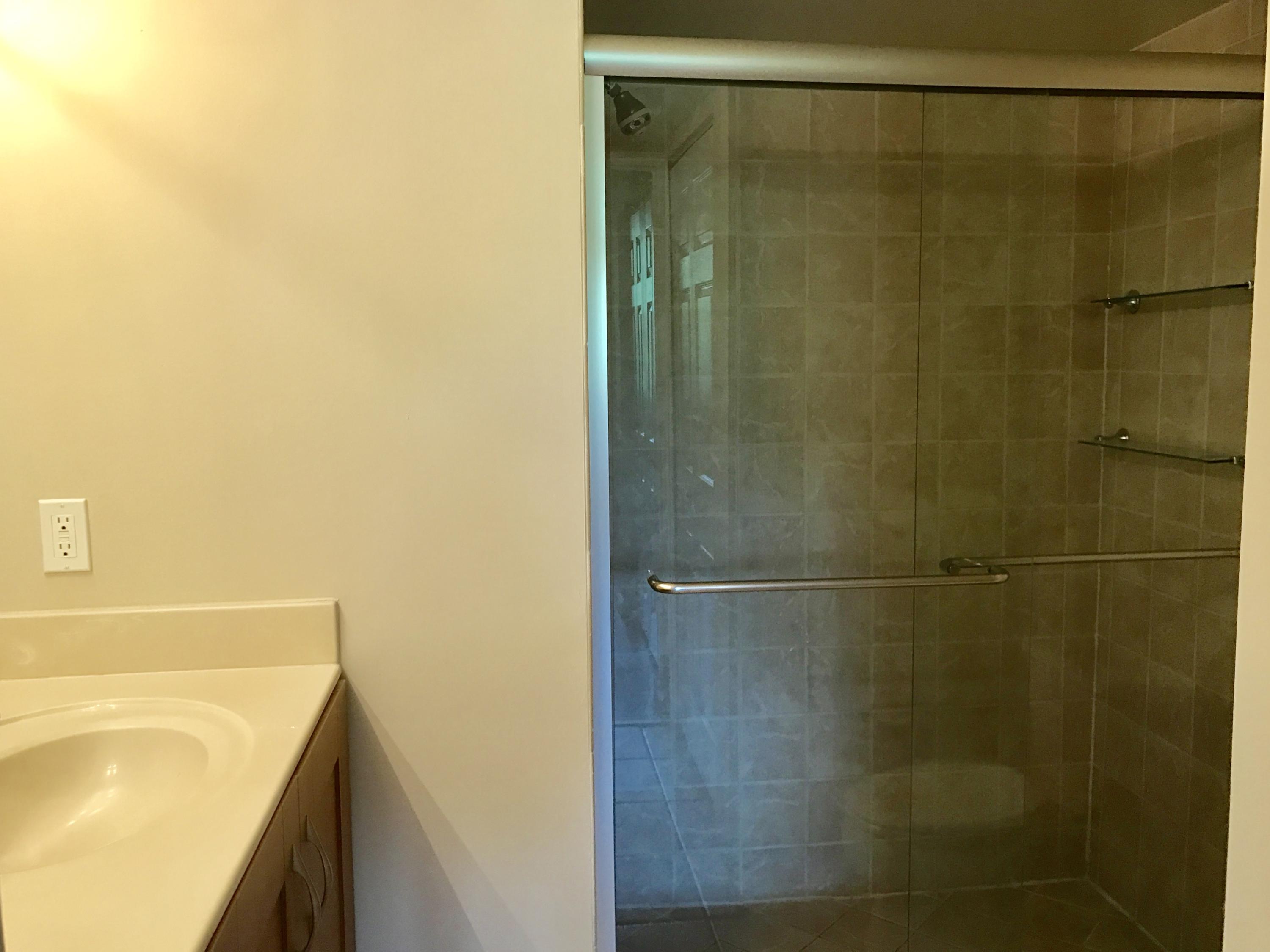 3111 Clint Moore Road, Unit 106 Boca Raton, FL 33496 - Photo 9 of 28 master bath