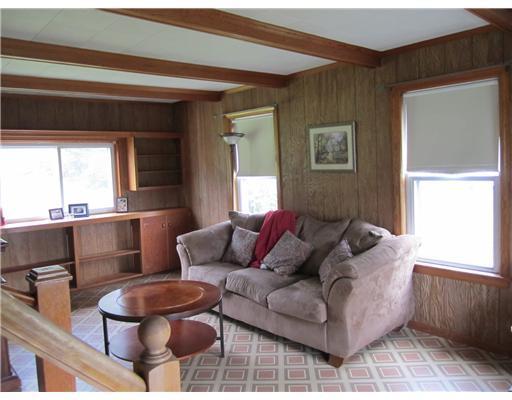 771 Skowhegan Road Fairfield, ME 04937 - Photo 3 of 12 Living Room. with built-in shelving