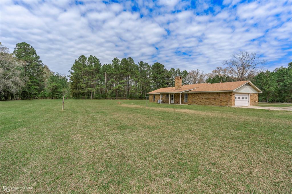 1303 Young Road Benton, LA 71006 - Photo 4 of 34 Backyard