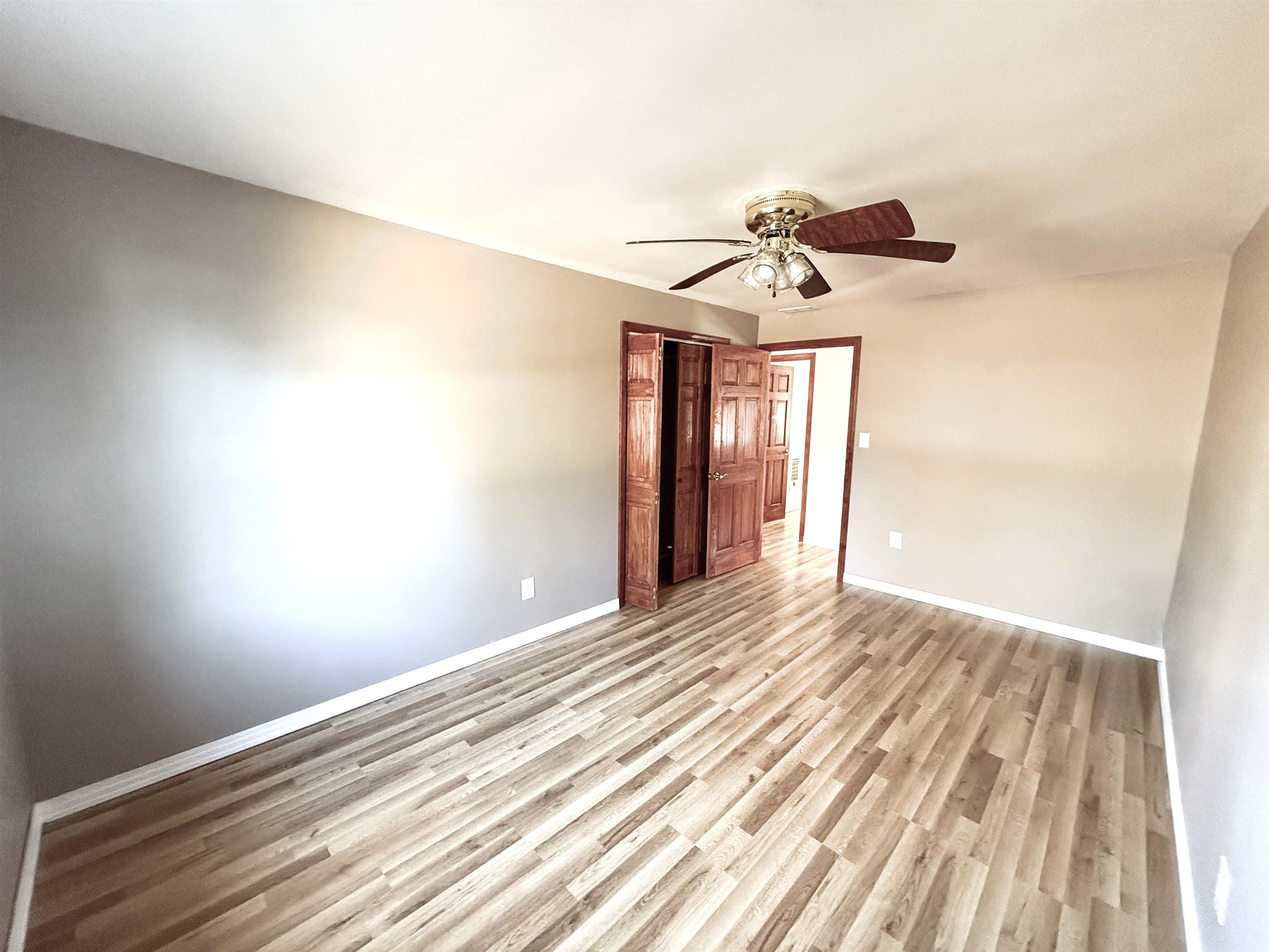 120 Rhodes Drive Middleton, TN 38052 - Photo 11 of 16 a view of empty room with ceiling fan