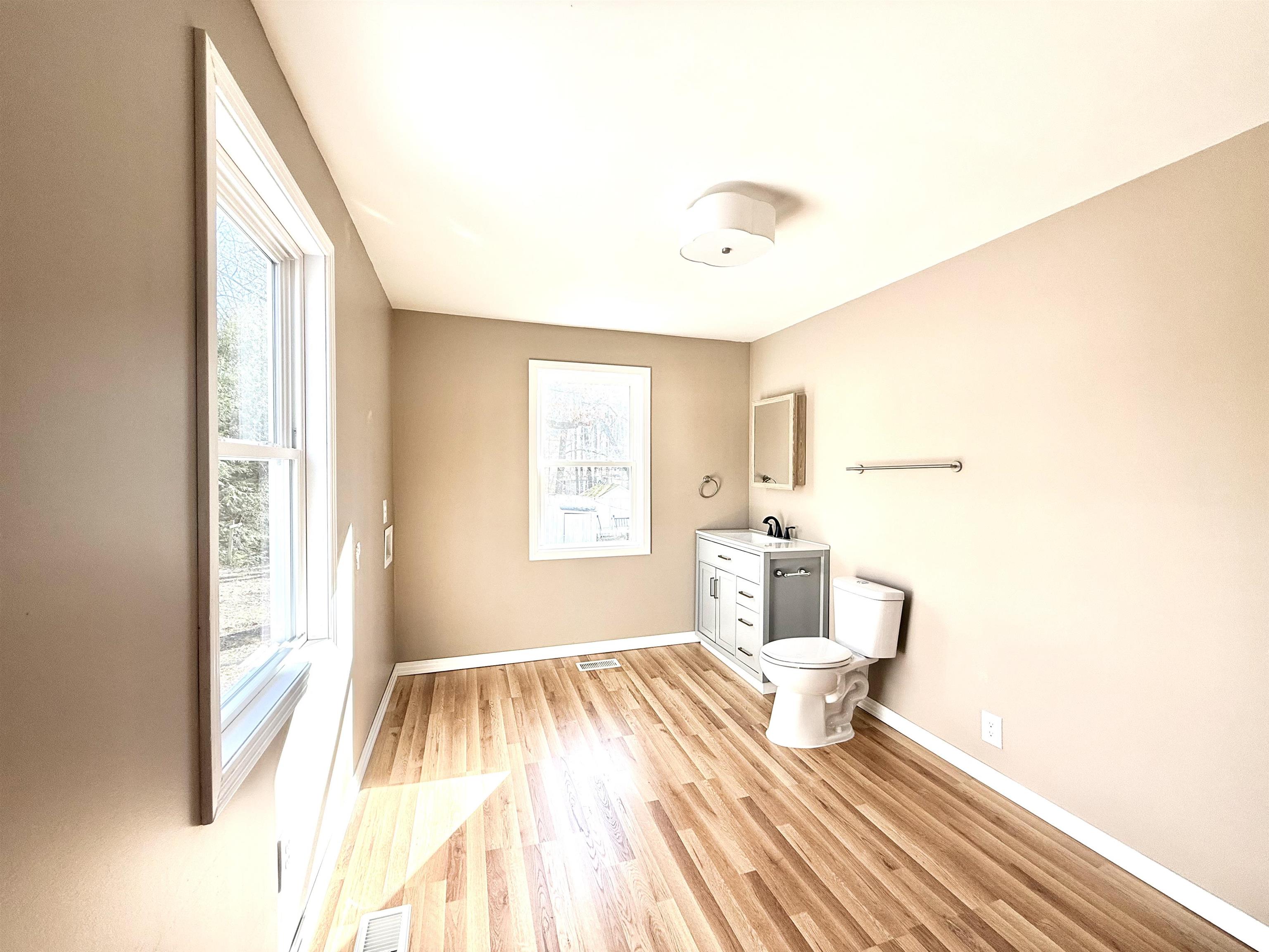 120 Rhodes Drive Middleton, TN 38052 - Photo 13 of 16 a bedroom with a bed and a window