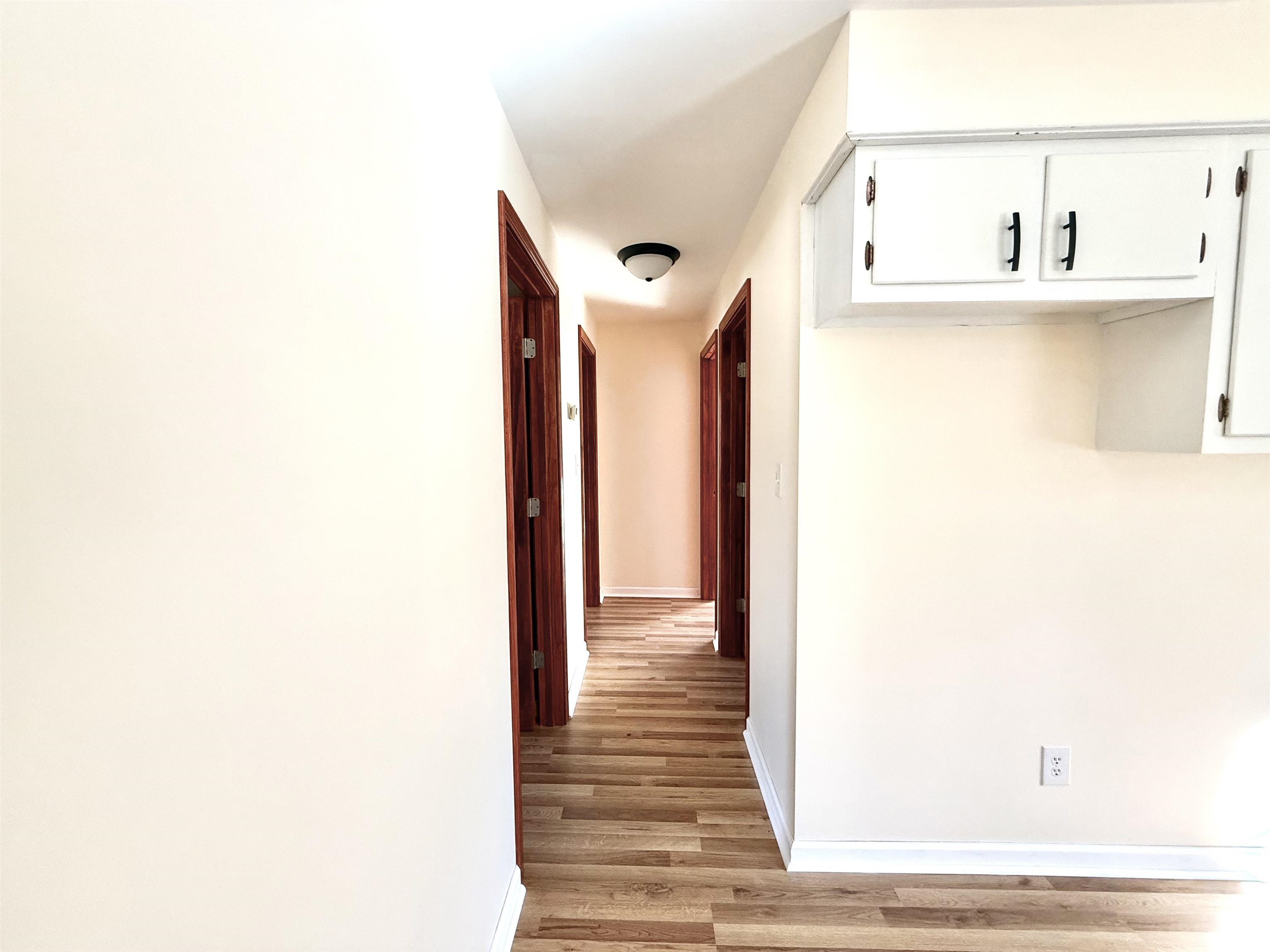 120 Rhodes Drive Middleton, TN 38052 - Photo 10 of 16 Hall featuring baseboards and light wood finished floors