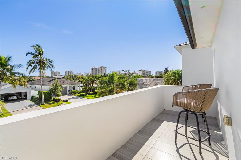 591 93rd Avenue North Naples, FL 34108 - Photo 19 of 35 Balcony off the loft