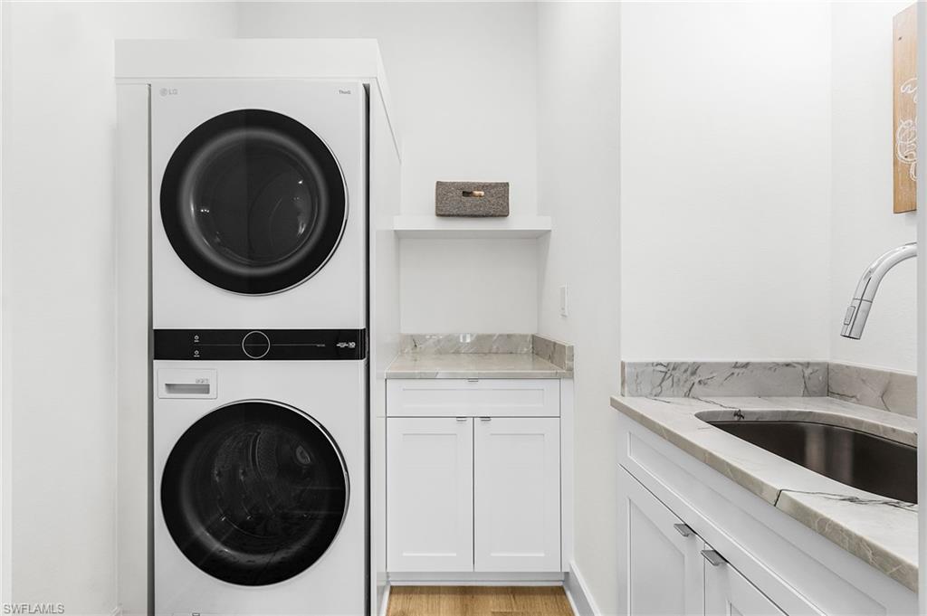 591 93rd Avenue North Naples, FL 34108 - Photo 27 of 35 2nd floor laundry room