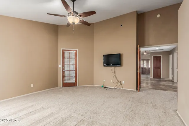 a view of a livingroom with a flat screen tv