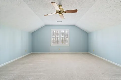 a view of porch with wooden floor