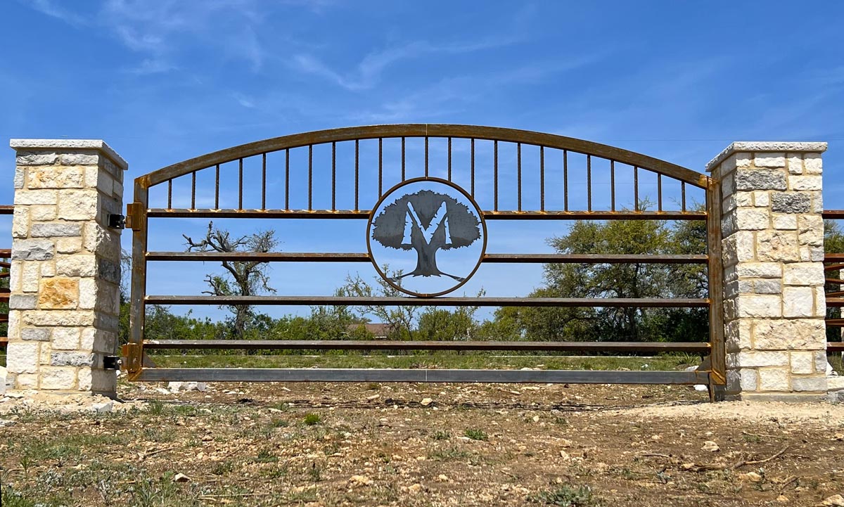Lot 3 West Fitzhugh Road Dripping Springs, TX 78620 - Photo 4 of 7 Secure entry to your private estate with a distinguished wrought iron gate and stone columns.