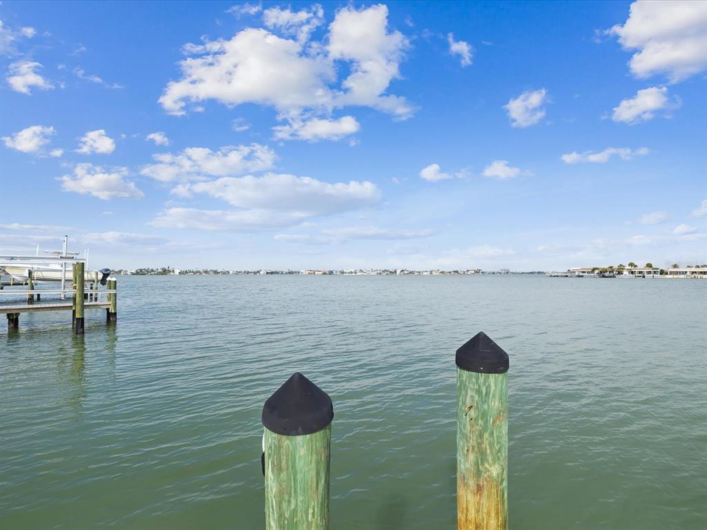 11549 48th Avenue North St. Petersburg, FL 33708 - Photo 27 of 37 a view of a lake with a terrace