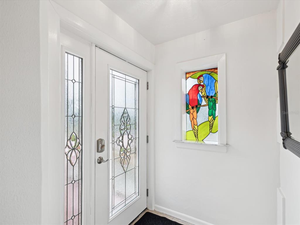 11549 48th Avenue North St. Petersburg, FL 33708 - Photo 37 of 37 a view of an entryway with wooden floor