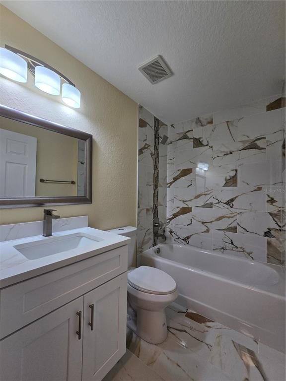 9 Locust Run Track Ocala, FL 34472 - Photo 23 of 38 a bathroom with a sink a toilet and shower