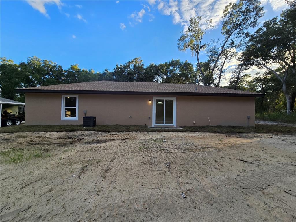 9 Locust Run Track Ocala, FL 34472 - Photo 4 of 38 a house view with a outdoor space