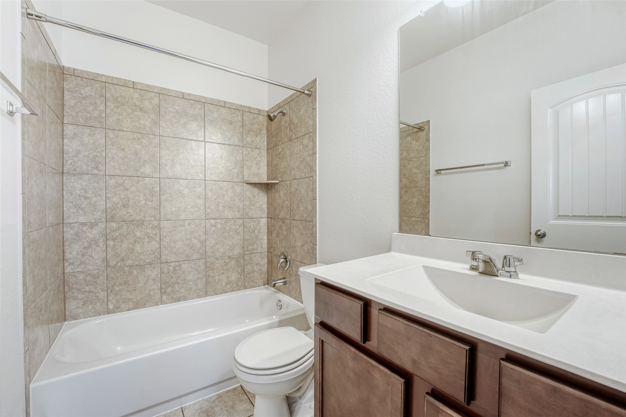 410 Anacua Loop, Unit 30 Manchaca, TX 78652 - Photo 27 of 33 Guest Full Bathroom featuring vanity and washtub / shower combination