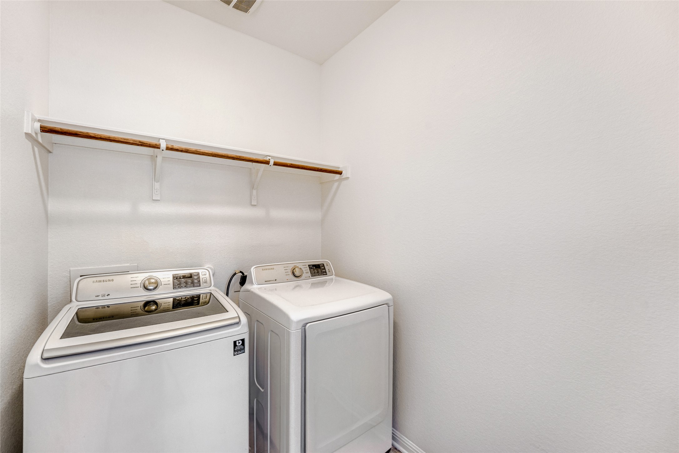 410 Anacua Loop, Unit 30 Manchaca, TX 78652 - Photo 28 of 33 Laundry area with washer and dryer
