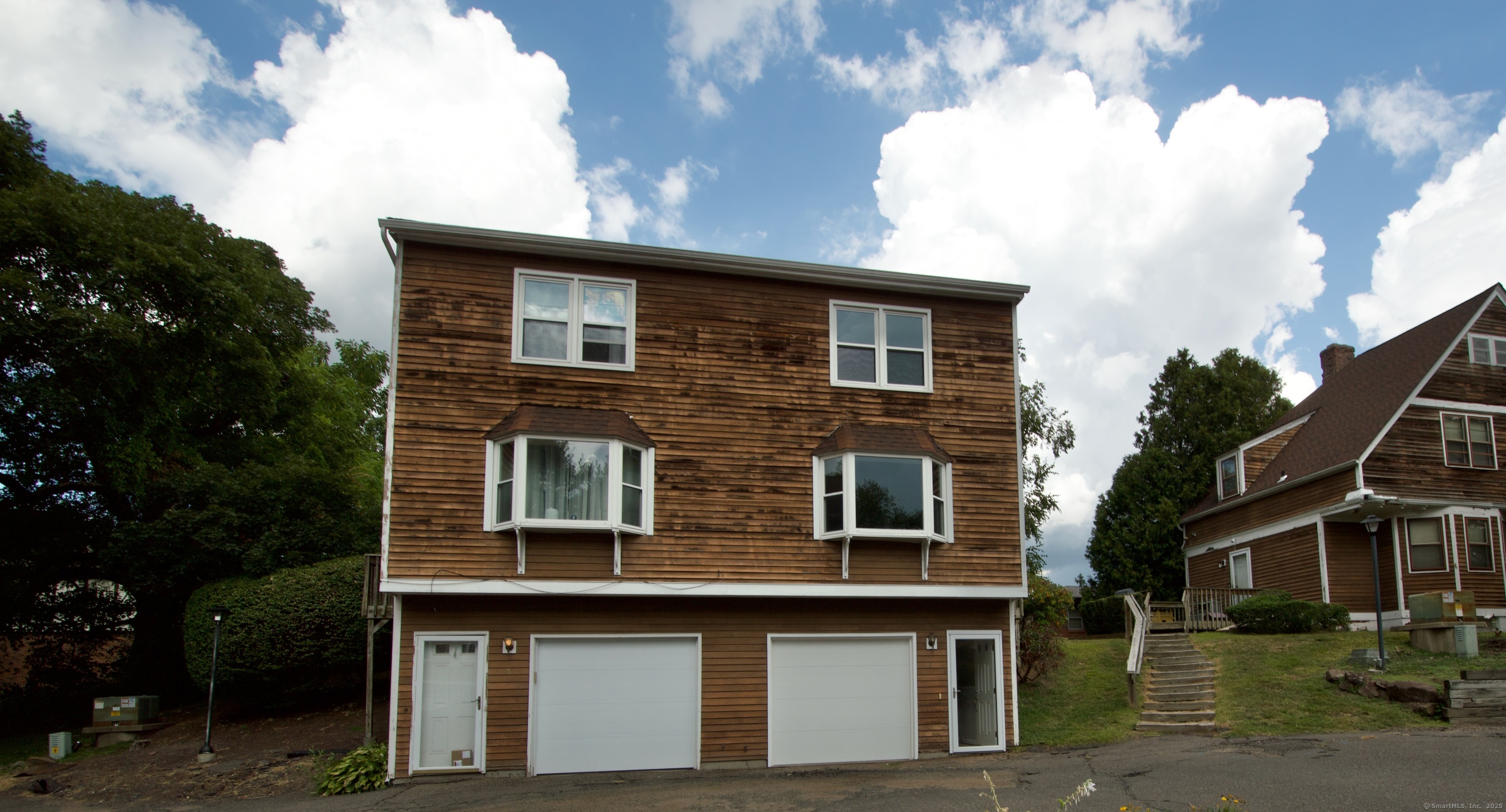 690 North Colony Road, Unit 7 Meriden, CT 06450 - Photo 1 of 1 a front view of a house with a yard