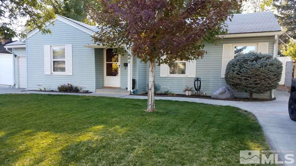 685 Arbutus Street Reno, NV 89509 - Photo 1 of 1 a front view of a house with a yard