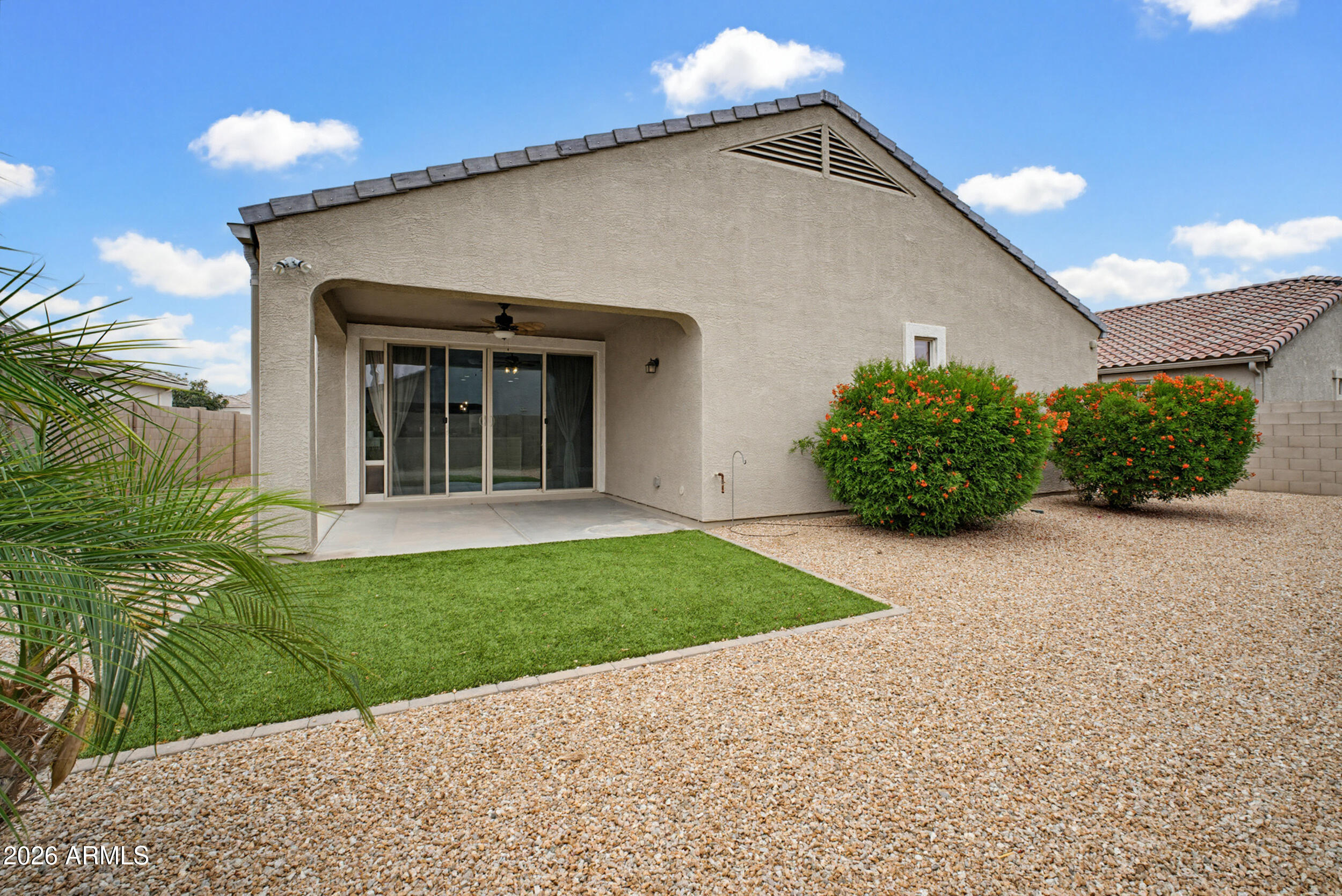 19995 North Ben Court Maricopa, AZ 85138 - Photo 40 of 51 a front view of a house with garden