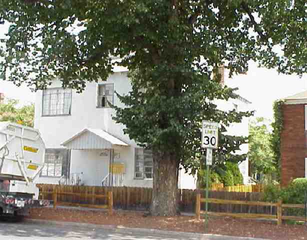 616 North Center Street Reno, NV 89501 - Photo 1 of 1 a front view of a house with a tree