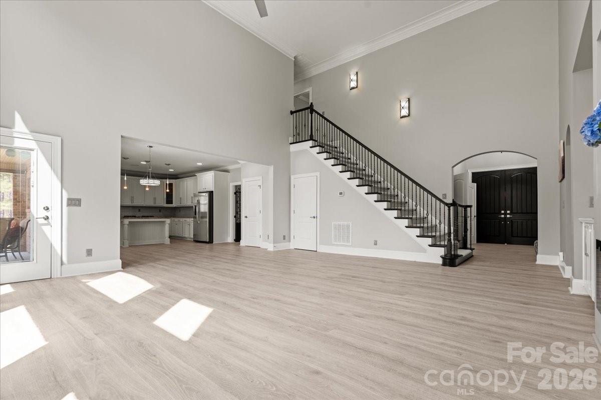 962 Miller Road Jefferson, SC 29718 - Photo 17 of 48 a view of a hallway with wooden floor and staircase