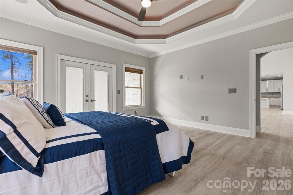 962 Miller Road Jefferson, SC 29718 - Photo 24 of 48 a bedroom with a bed and wooden floor