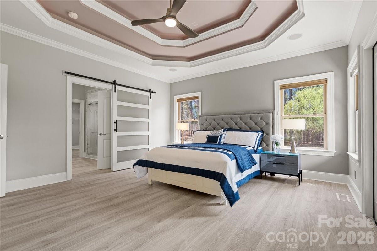 962 Miller Road Jefferson, SC 29718 - Photo 25 of 48 a bedroom with a bed and a window