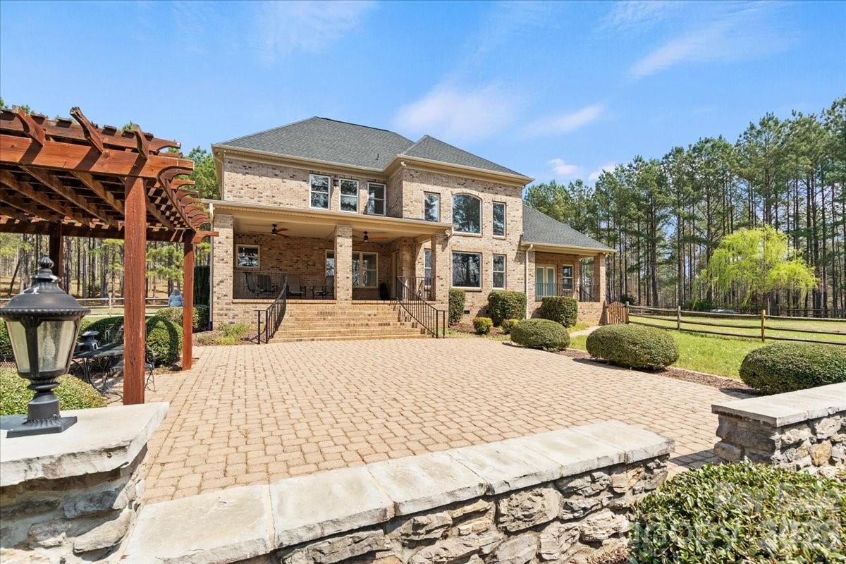 962 Miller Road Jefferson, SC 29718 - Photo 3 of 48 a front view of a house with swimming pool