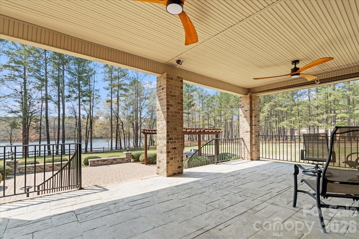 962 Miller Road Jefferson, SC 29718 - Photo 41 of 48 a view of porch with a floor to ceiling window next to a yard