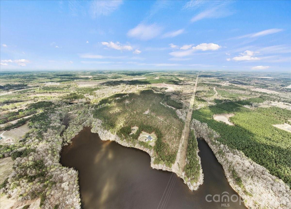 962 Miller Road Jefferson, SC 29718 - Photo 47 of 48 a view of a lake with a yard