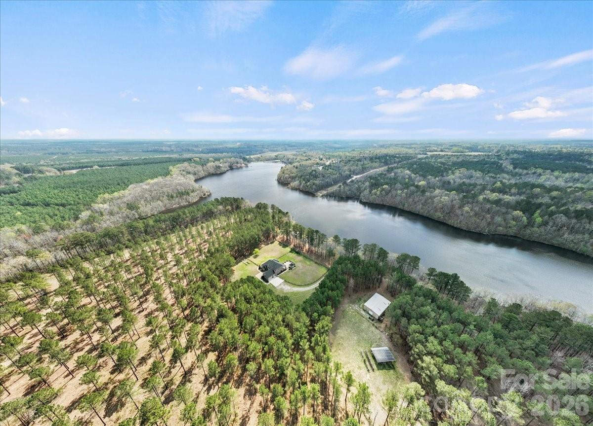 962 Miller Road Jefferson, SC 29718 - Photo 5 of 48 a view of a lake with a city