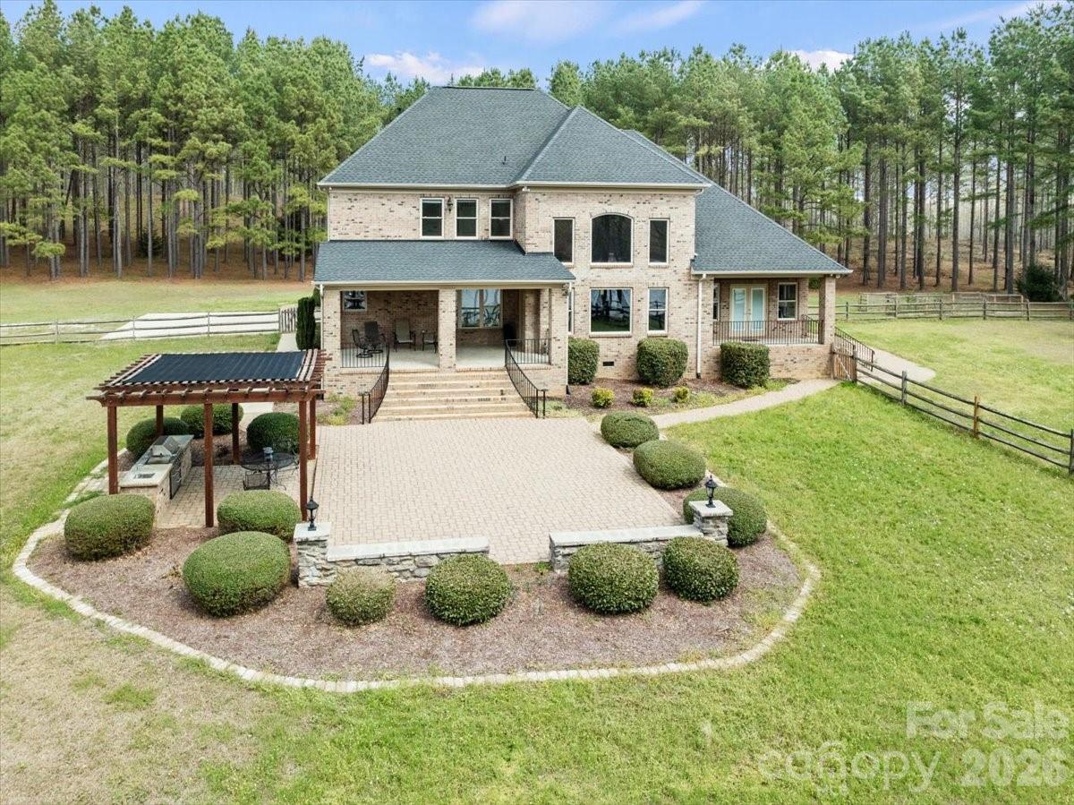 962 Miller Road Jefferson, SC 29718 - Photo 7 of 48 a view of a house with backyard and sitting area