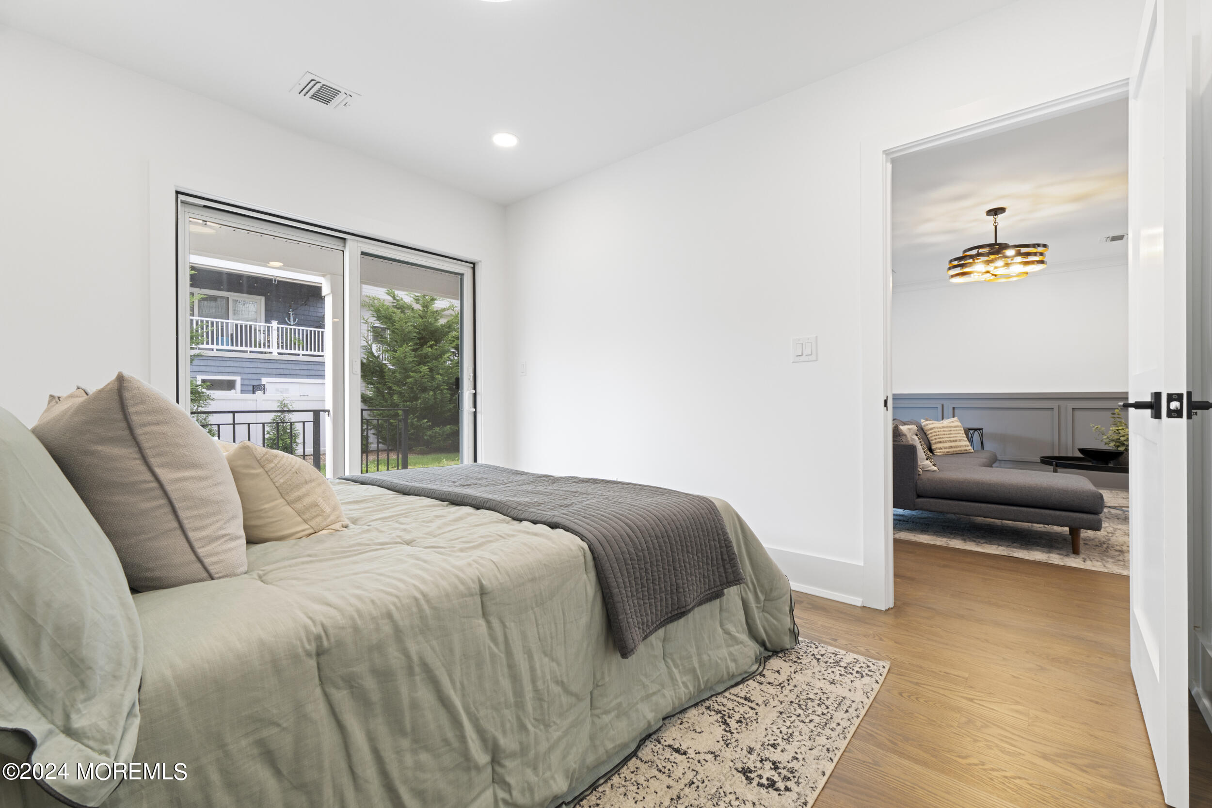 40 Seaview Avenue, Unit A Long Branch, NJ 07740 - Photo 13 of 62 a bedroom with a large bed and a window