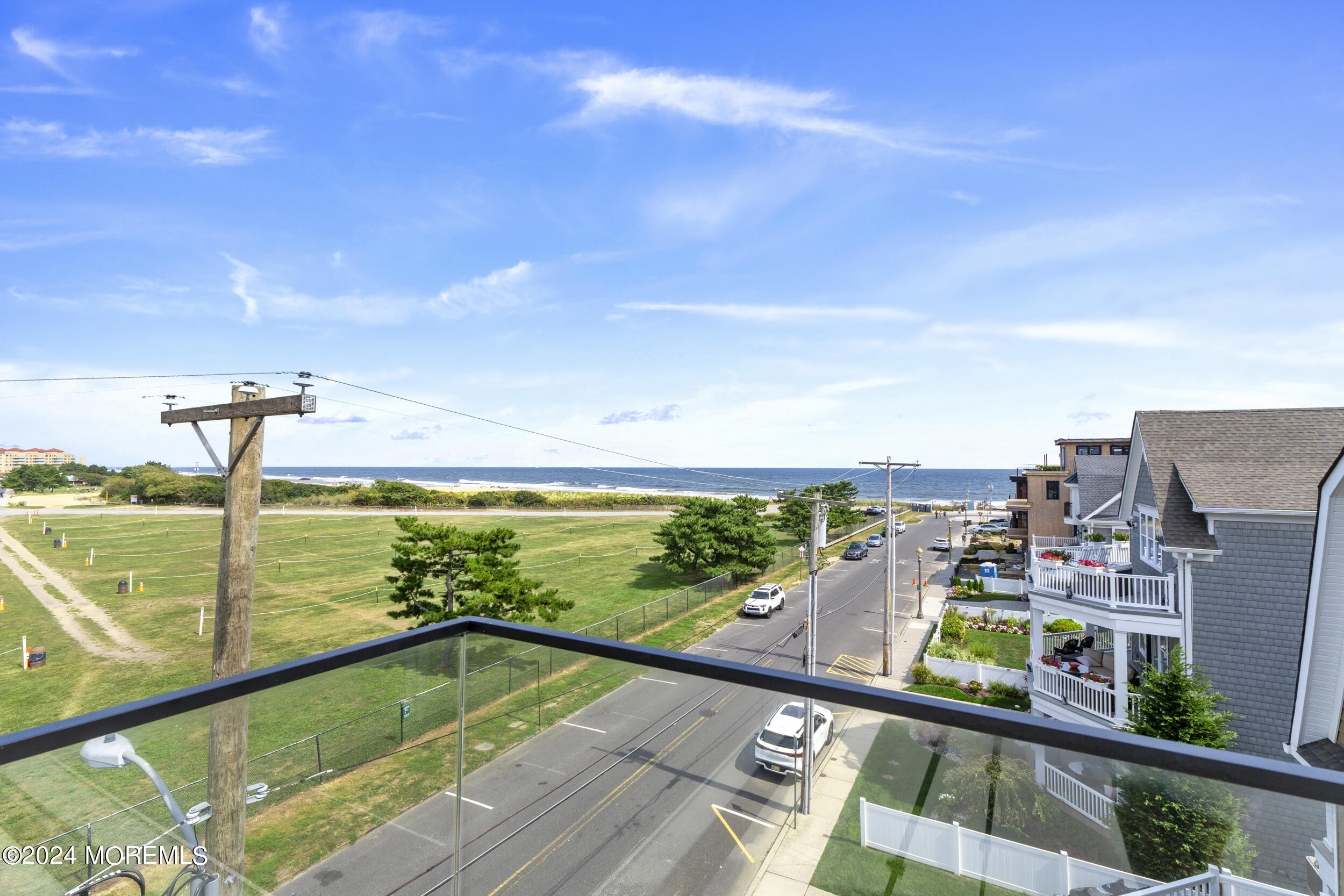 40 Seaview Avenue, Unit A Long Branch, NJ 07740 - Photo 30 of 62 a view of a balcony with an ocean view