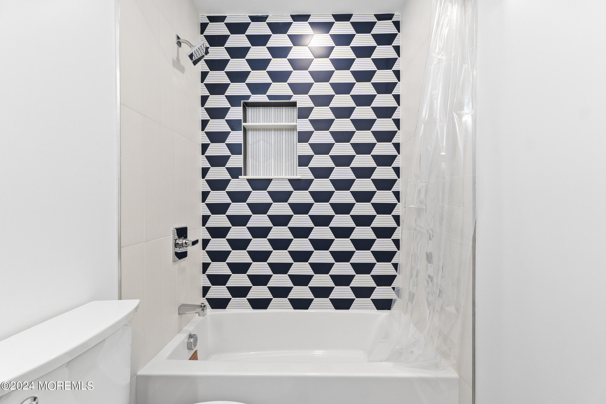 40 Seaview Avenue, Unit A Long Branch, NJ 07740 - Photo 35 of 62 a bathroom with a bathtub and a shower