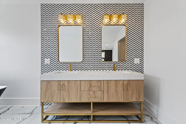 a bedroom with a bed and a night stand